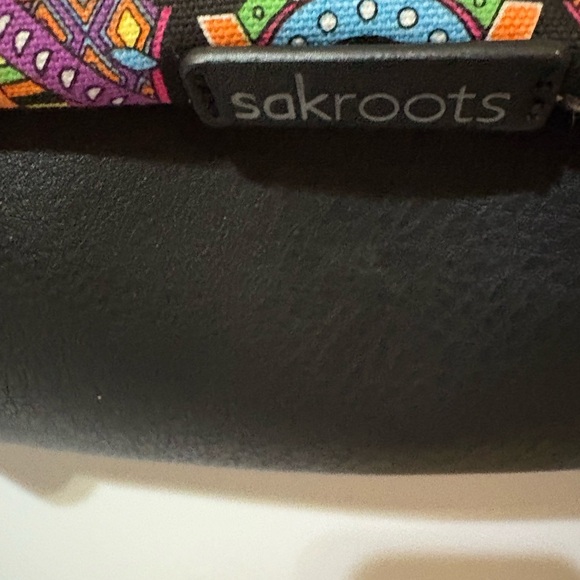 Sakroots bag, characterized by its distinctive bohemian and colorful design. - Picture 6 of 12
